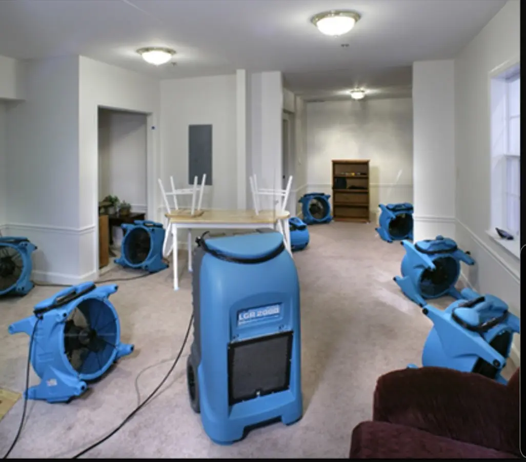 Air movers and dehumidifier setup for Water Extraction & Removal in Garrett